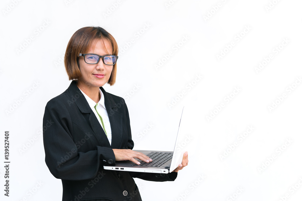 Business concept : Asian business woman wear glasses and using laptop on white background.