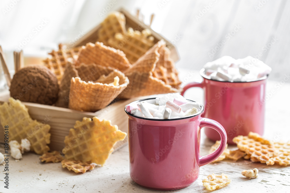 two cups of cocoa with marshmallows two cups of cocoa with marshmallows