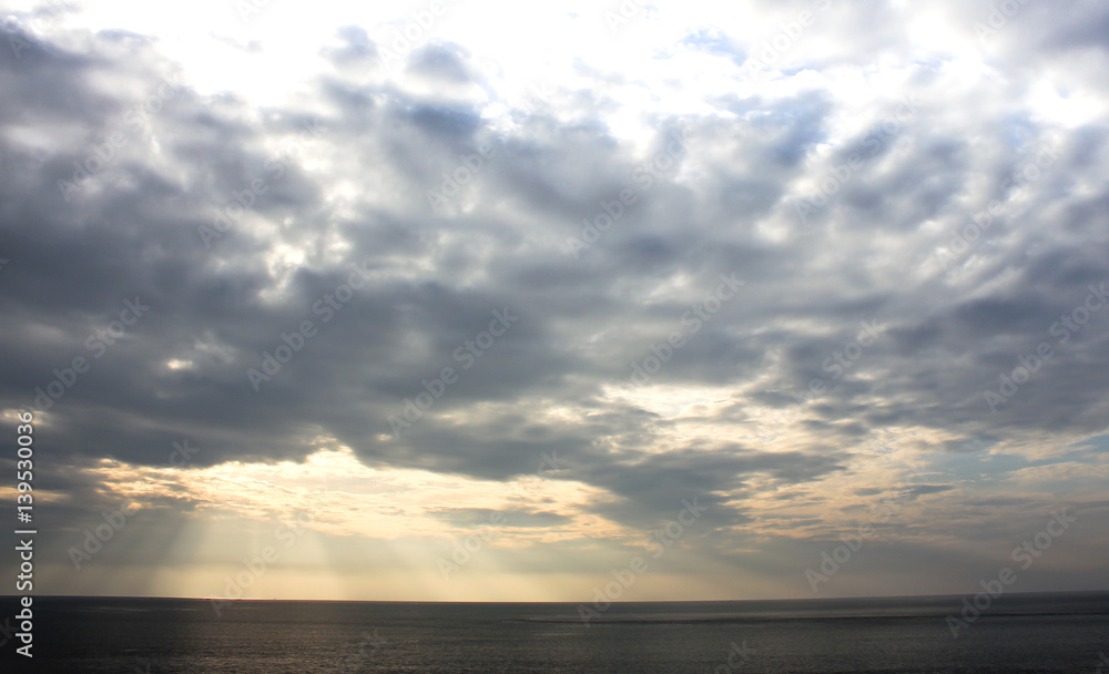 Beautiful tropical sunset beach , silhouette over the sea,