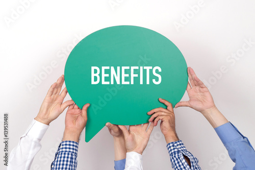 Group of people holding the BENEFITS written speech bubble photo