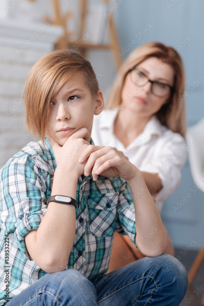 Thoughtful young male person thinking about problems Thoughtful young male person thinking about problems