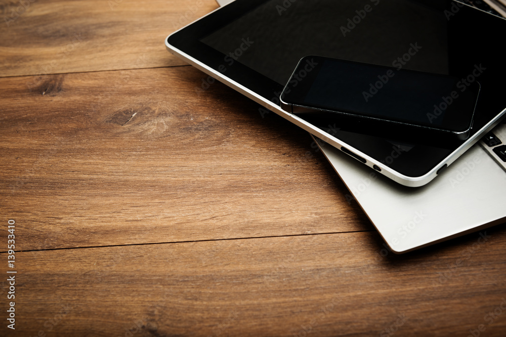 keyboard with phone and tablet pc on wooden desk keyboard with phone and tablet pc on wooden desk