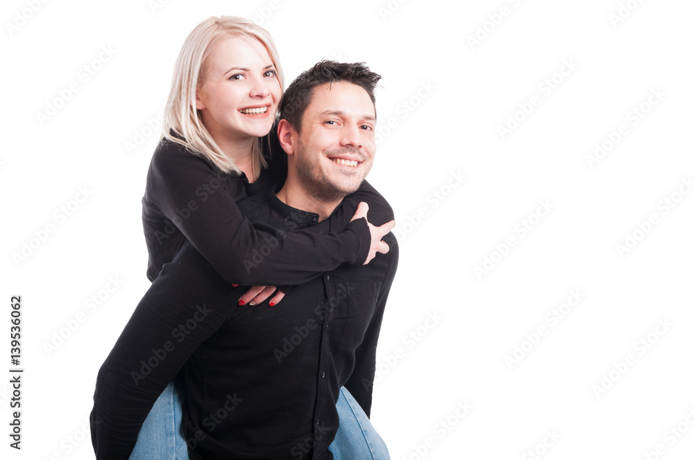 Cheerful smiling couple in love hugging Cheerful smiling couple in love hugging