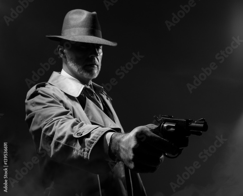 Spy agent pointing a gun