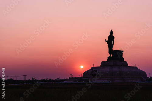 Silhouette of Big Buddha in sunset time