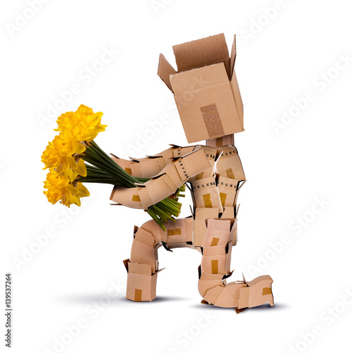 Fototapeta Naklejka Na Ścianę i Meble -  Boxman on bended knee with flowers