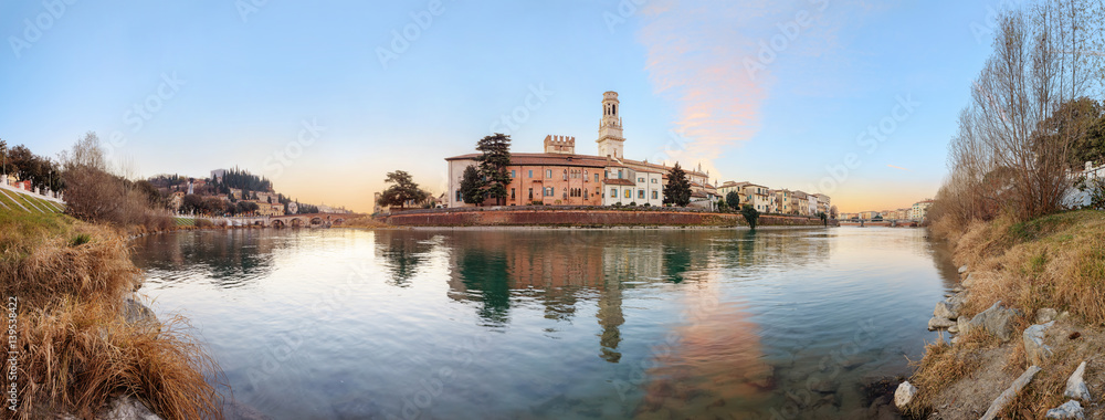historical quarter of Verona, panorama from river on ponte Pietra bridge and Duomo Cathedral at sunrise