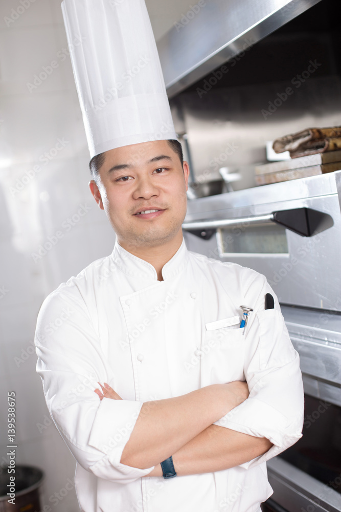 young man chelf in modern kitchen young man chelf in modern kitchen