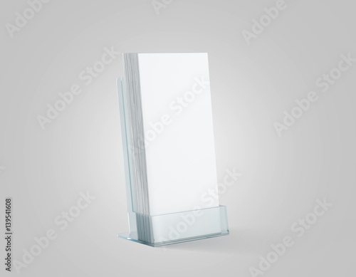 Blank white flyers stack mockup in glass plastic holder, 3d rendering. Dl fliers mock ups stand in the acrylic box. Brochure template holding in transparent plexiglass pocket. Booklets in plastic tray photo