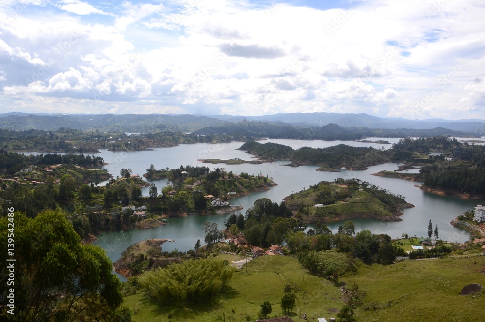Winding waterways of a lake in central Colombia surrounded by greenery in Spring. Winding waterways of a lake in central Colombia surrounded by greenery in Spring.