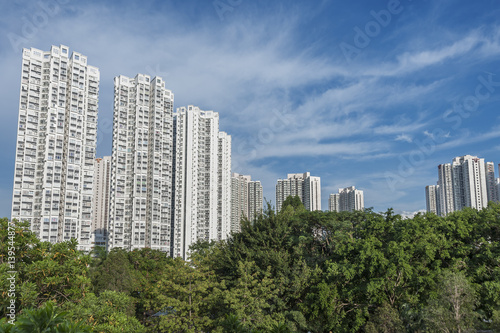 Highrise residential building in Hong Kong city © leeyiutung