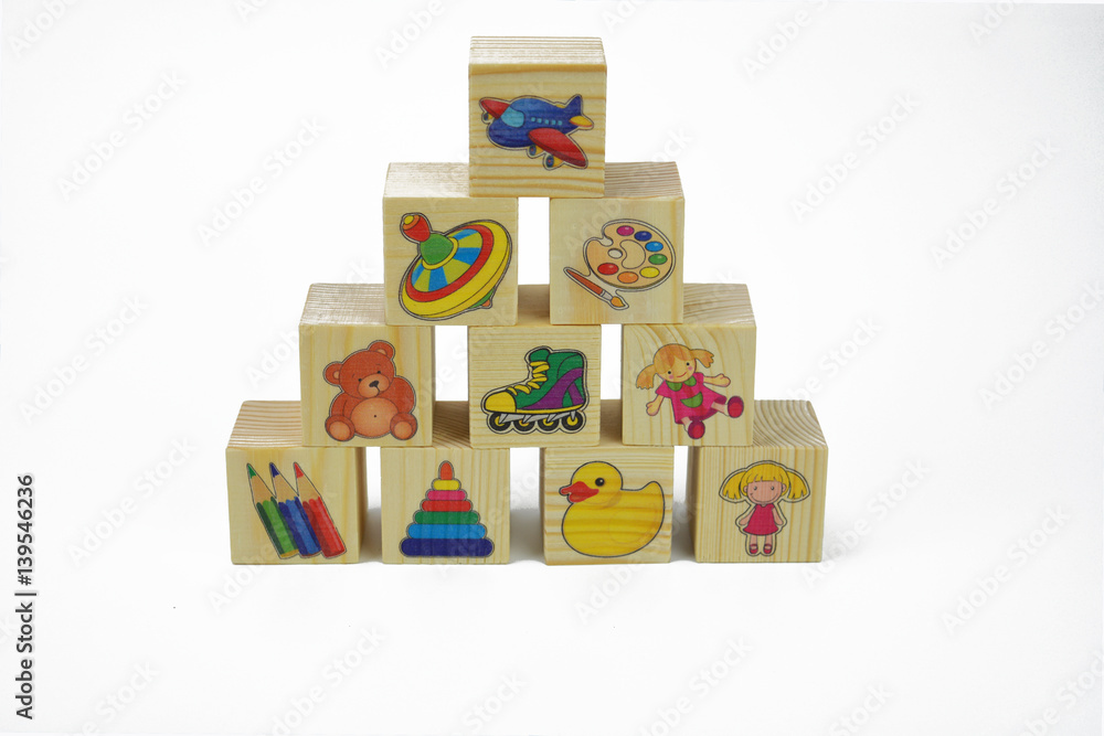 Toy wooden pyramid of blocks with pictures