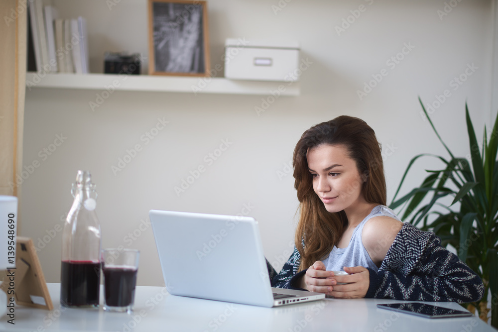Young business girl in her personal workspace working Young business girl in her personal workspace working