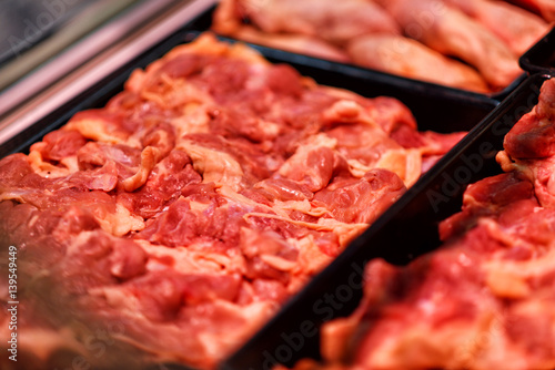 Canvas-taulu Heap of fresh raw meat food flesh background at shop supermarket