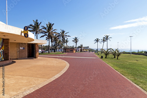  Red Paved Promenade on Beachfront City Landscape