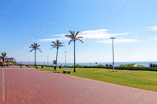  Red Paved Promenade on Beachfront City Landscape