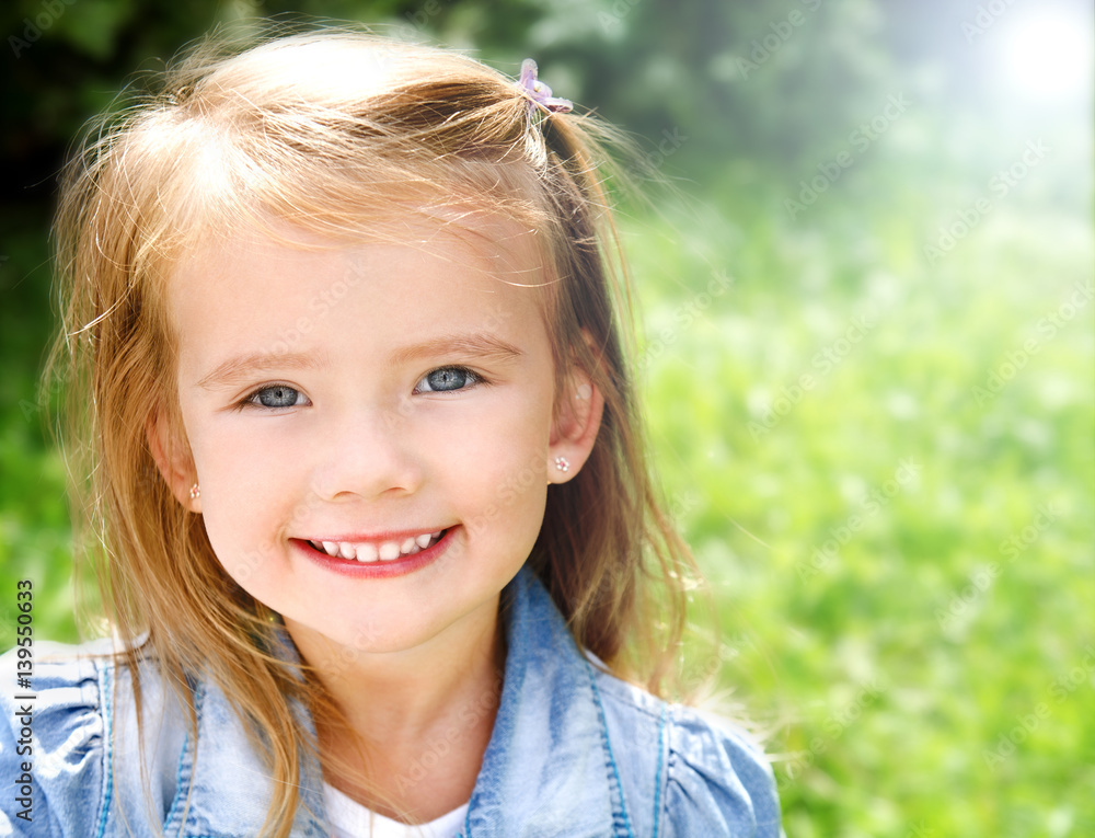 Outdoor portrait of smiling little girl Outdoor portrait of smiling little girl