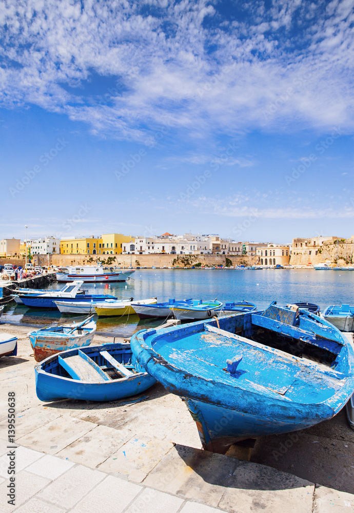 Fishermen`s boats in Gallipoli town, Apulia, Southern Italy