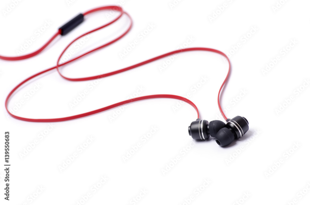 Red earphones on a white background Red earphones on a white background