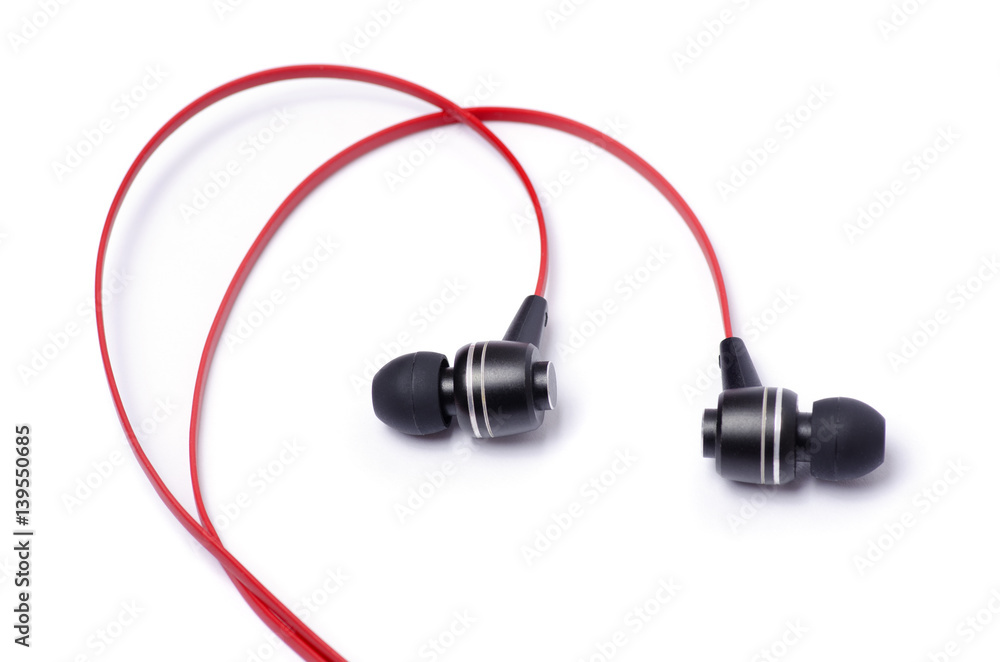 Red earphones on a white background Red earphones on a white background