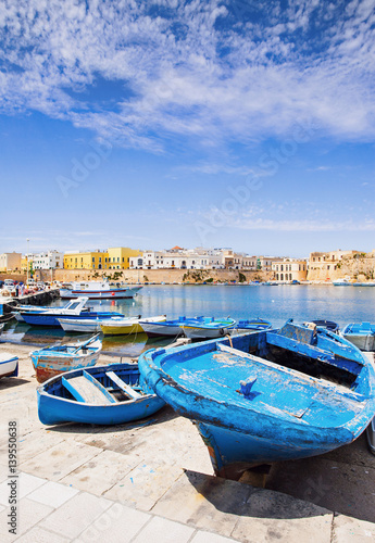 Fishermen`s boats in Gallipoli town, Apulia, Southern Italy © kite_rin