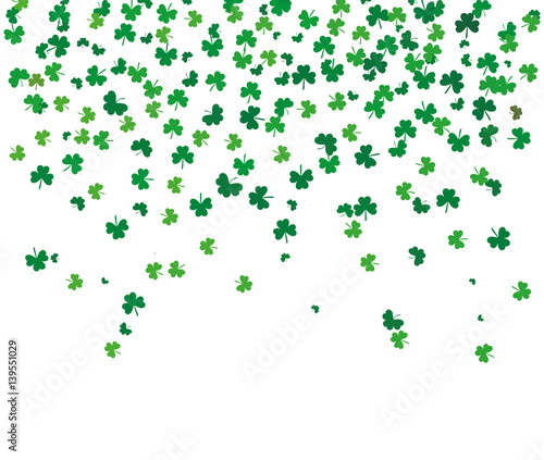 Flying leaves of clover different shades of green on a white background. Pattern for St. Patrick s Day. Rectangular  horizontal backdrop. Vector illustration with copy space