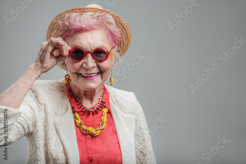 Fotografia Funny senior lady looking at camera