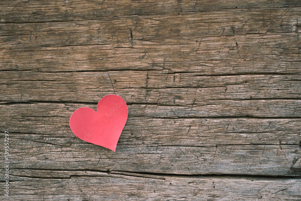 Red blank paper note with heart shape on grunge wooden background Red blank paper note with heart shape on grunge wooden background