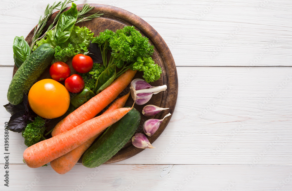 Border of fresh vegetables on wooden background with copy space Border of fresh vegetables on wooden background with copy space