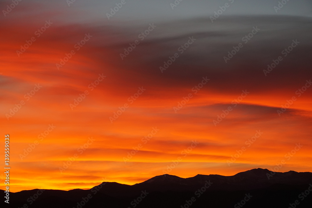 Rocky Mountain Silhouette with nature's choice of colors for a Colorado sunset