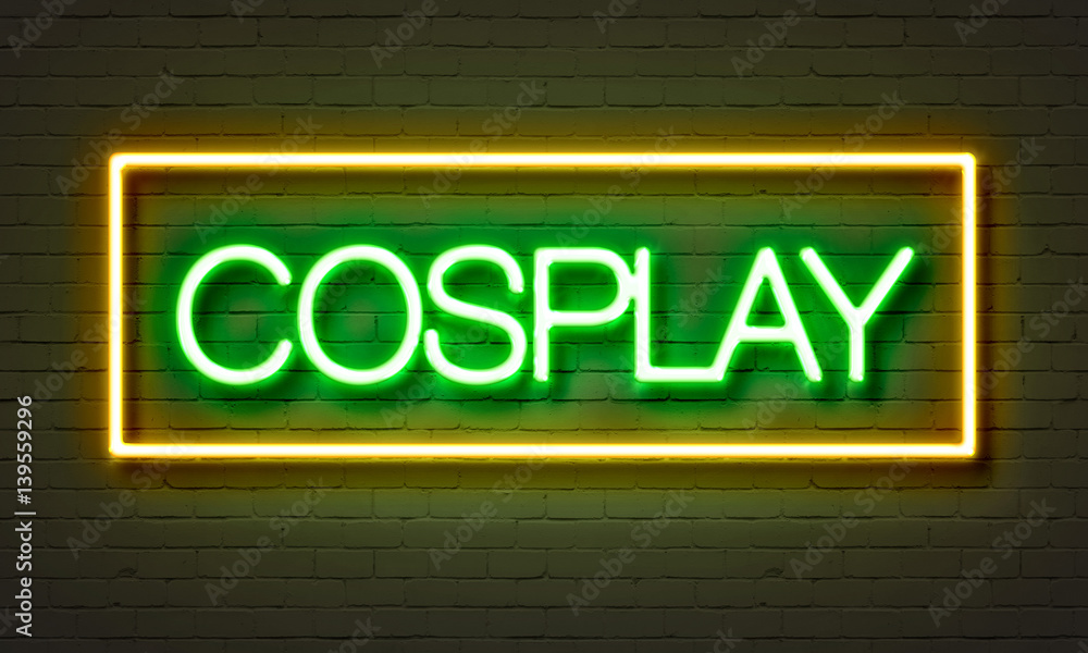 Cosplay neon sign on brick wall background. Cosplay neon sign on brick wall background.