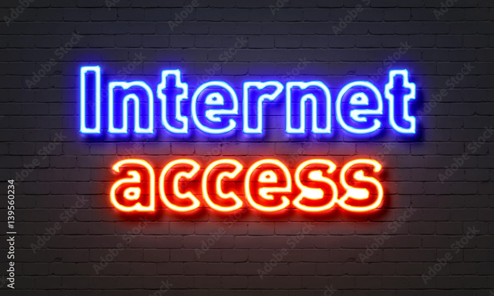 Internet access neon sign on brick wall background.