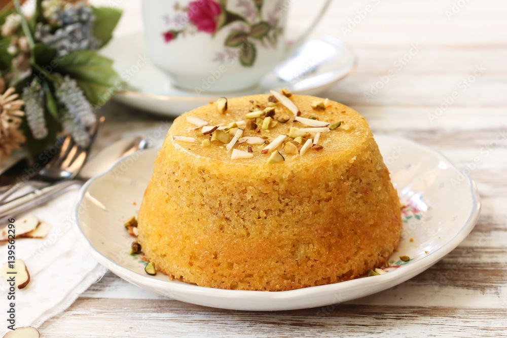 Gluten free Almond cornmeal cake topped with nuts, selective focus Gluten free Almond cornmeal cake topped with nuts, selective focus
