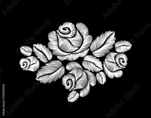 White roses embroidery on black background.