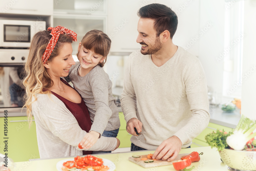 Young family in the kitchen Young family in the kitchen