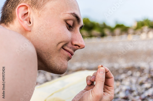 Small stone in hand photo