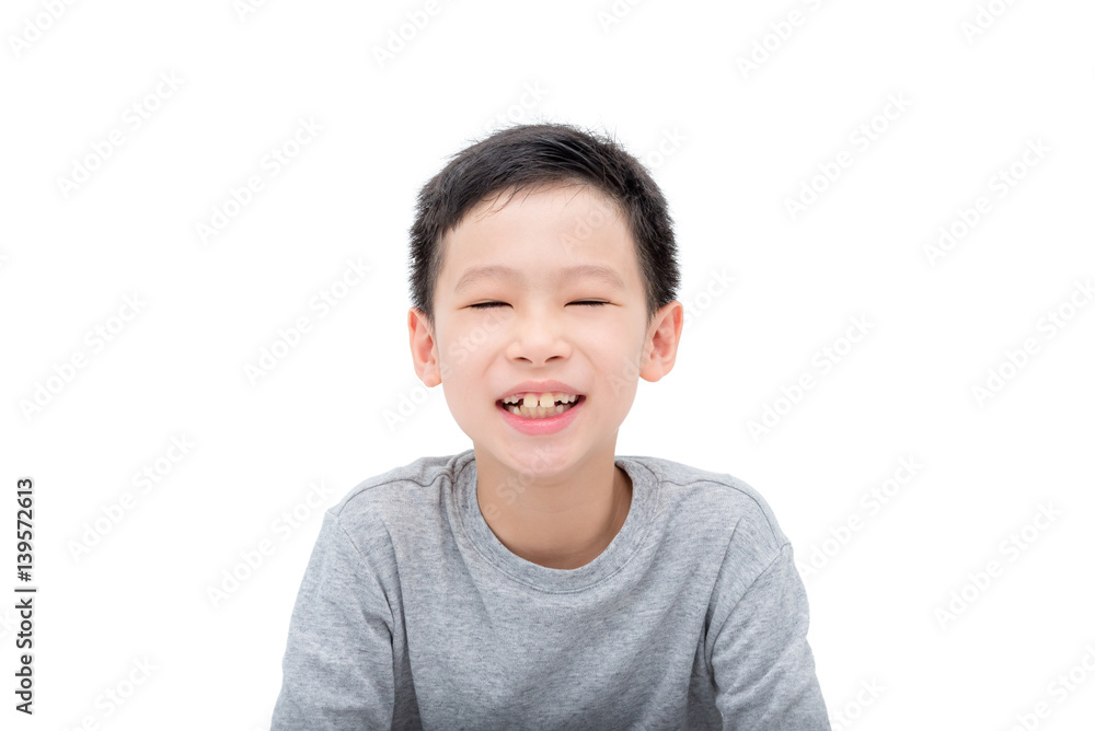 Young asian boy smiles over white background Young asian boy smiles over white background