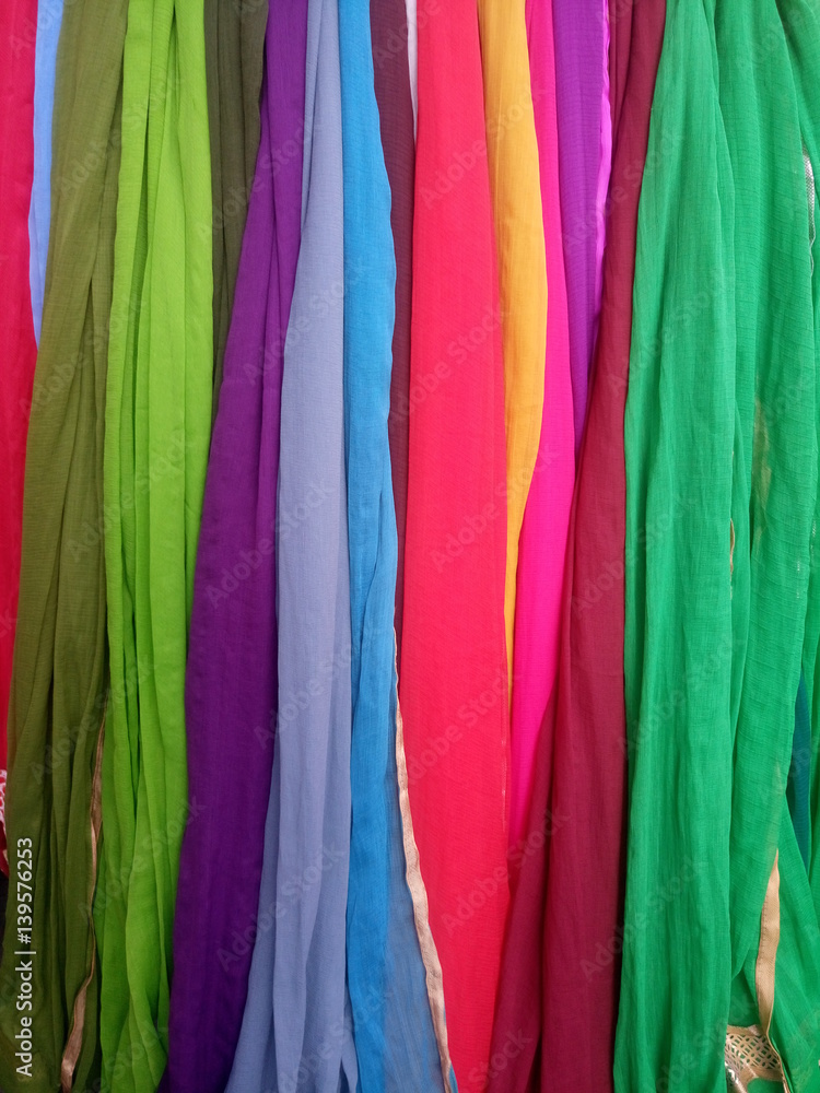 Colorful clothes for sale at store