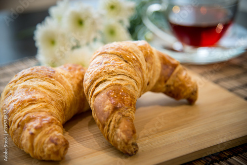 Croissant with hot tea