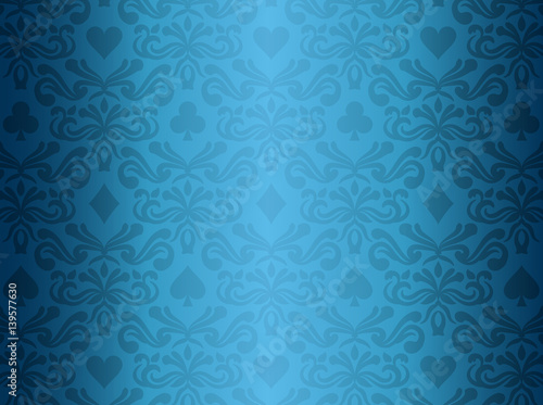 Blue background with poker symbols surrounded by floral ornament pattern
