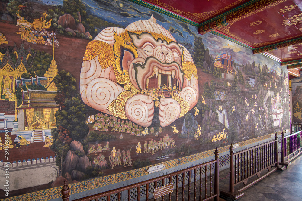 Obraz premium Thai mural paintings at Wat Phra Kaew. Scenes of Ramayana anciet Indian story are painted in the gallery along the temple's wall