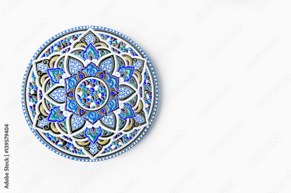Fototapeta premium Oriental ceramic plate with beautiful colorful ornament