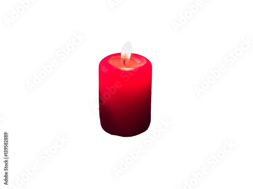Red wax candle with fire isolated on white background
