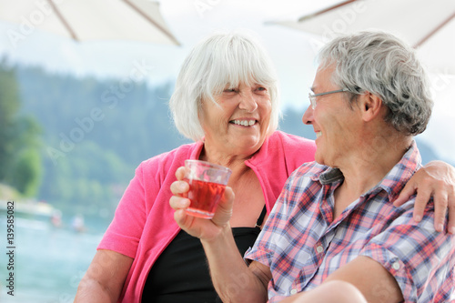 Series of a Cute Senior Couple (Man and Woman) on Vacation in Summer, Together, Portraits, with Cocktails and without