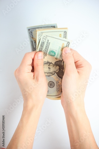 men hands hold and counting us dollar banknotes isolated