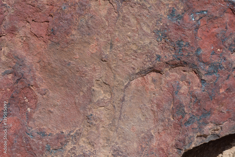 Fototapeta premium Textured surface of colorful rock