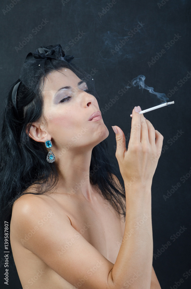 Fototapeta premium girl with a cigarette