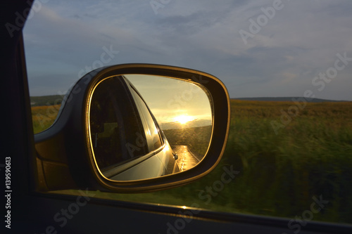 sunset in the rerview mirror © brszattila