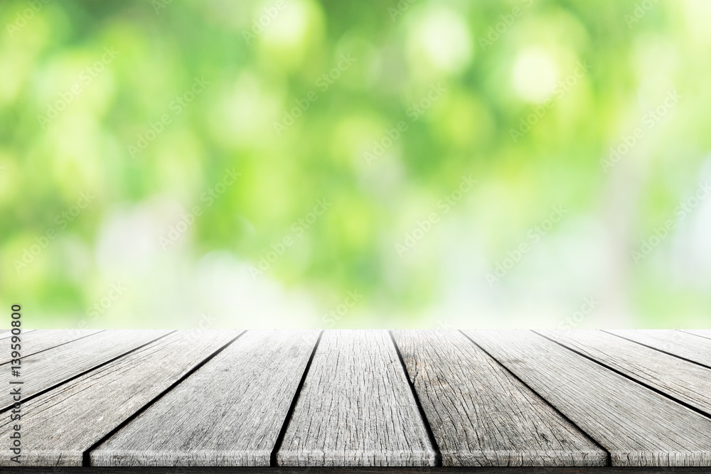 Empty wooden table with blurred city park on background. concept party, products, spring. Empty wooden table with blurred city park on background. concept party, products, spring.