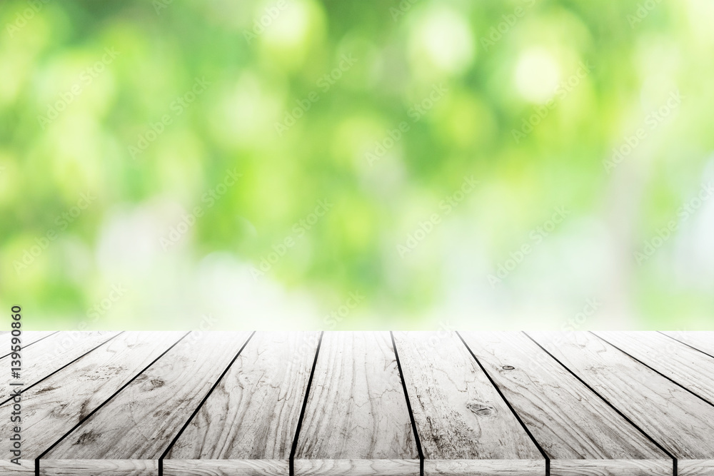 Empty wooden table with blurred city park on background. concept party, products, spring. Empty wooden table with blurred city park on background. concept party, products, spring.